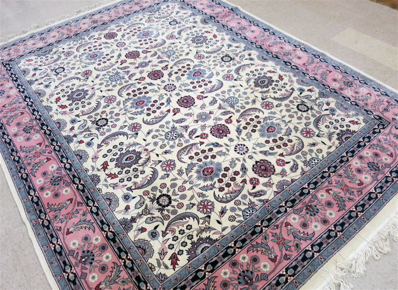 Appraisal: HAND KNOTTED ORIENTAL CARPET Indo-Persian overall floral design on cream