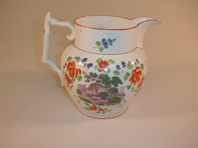 Appraisal: An early thC Staffordshire pottery jug hand painted over a