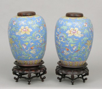 Appraisal: A Pair of th Century Chinese Porcelain Urns on Stands