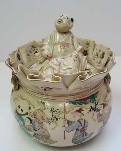 Appraisal: A Japanese Earthenware Tobacco Jar in a pouch form with