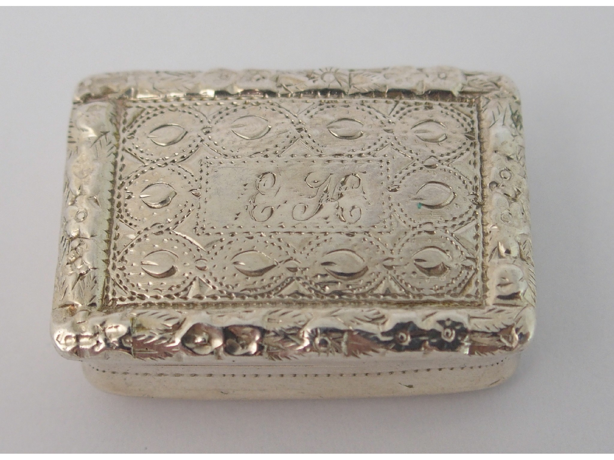 Appraisal: A silver vinaigretteby Nathaniel Mills Birmingham circa of rectangular shape