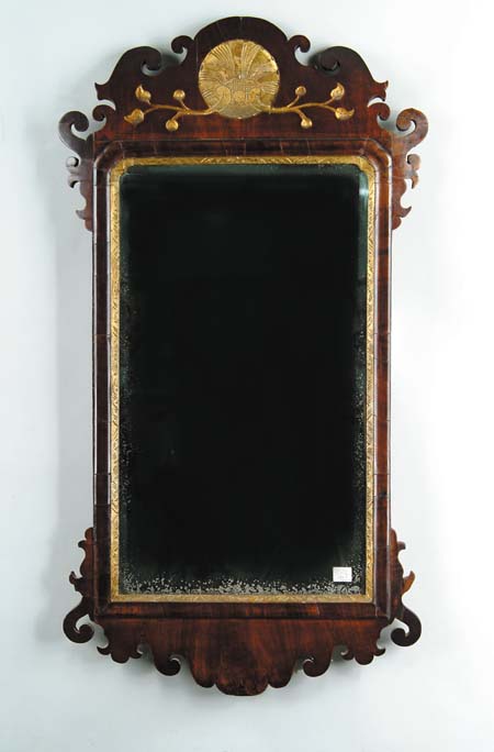 Appraisal: FINE CARVED MAHOGANY QUEEN ANNE MIRROR Top crest scroll carved