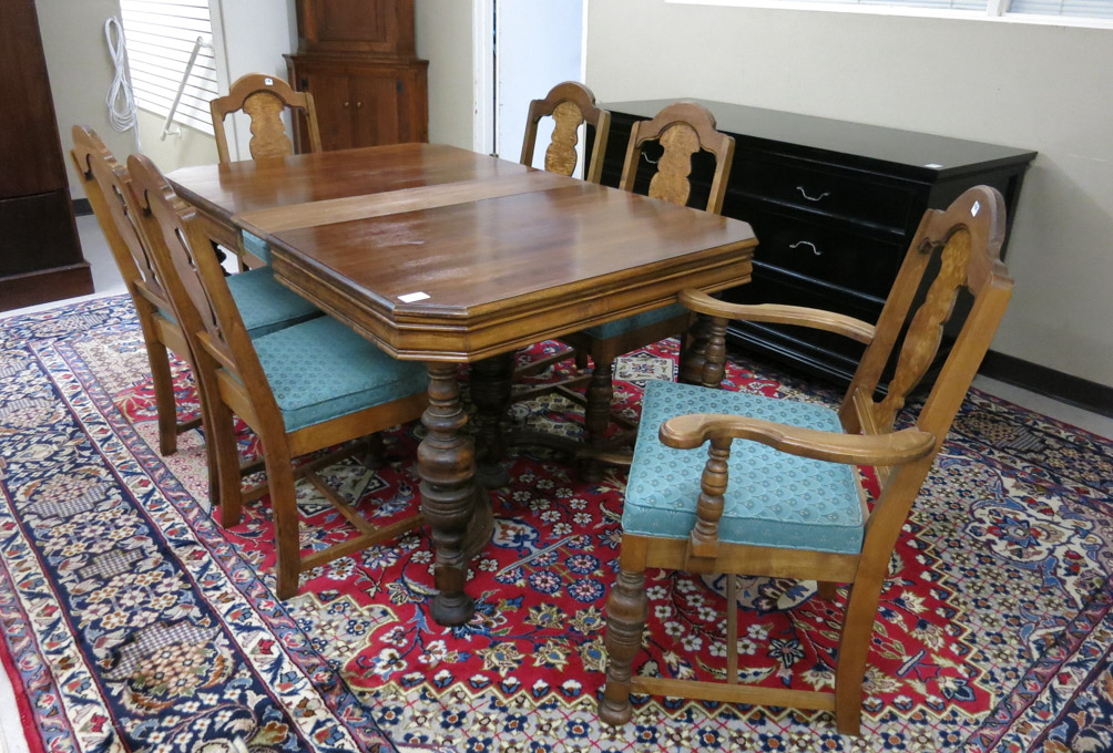 Appraisal: WALNUT DINING TABLE AND SIX CHAIRS SET American c s