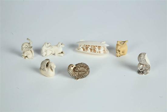 Appraisal: SIX NETSUKES AND ONE CARVING Japan th century ivory Squirrel