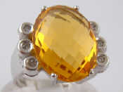 Appraisal: A white metal tests carat gold citrine and diamond ring