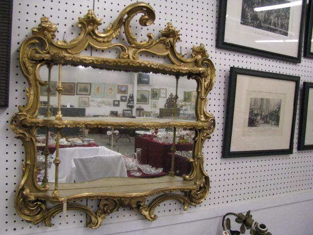 Appraisal: French Victorian Wall Shelf mirrored back gold finish