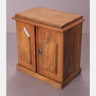 Appraisal: A Regency Style Rosewood Cabinet with Drawers and Banded Inlay