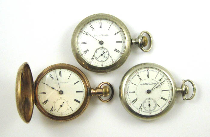 Appraisal: THREE AMERICAN POCKET WATCHES Elgin hunter case model size grade