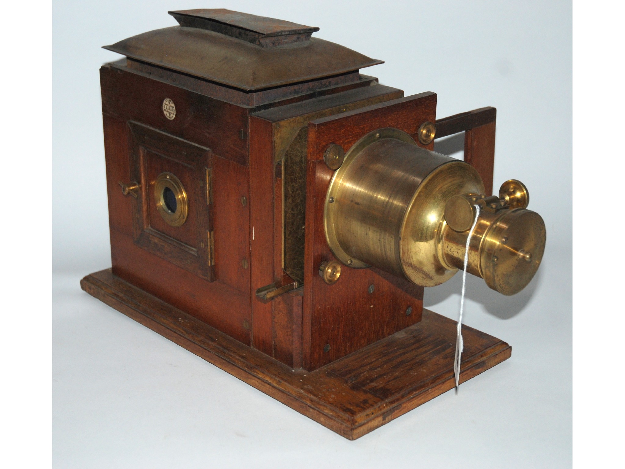 Appraisal: A magic lantern by Lizars of Glasgow with brass fitments