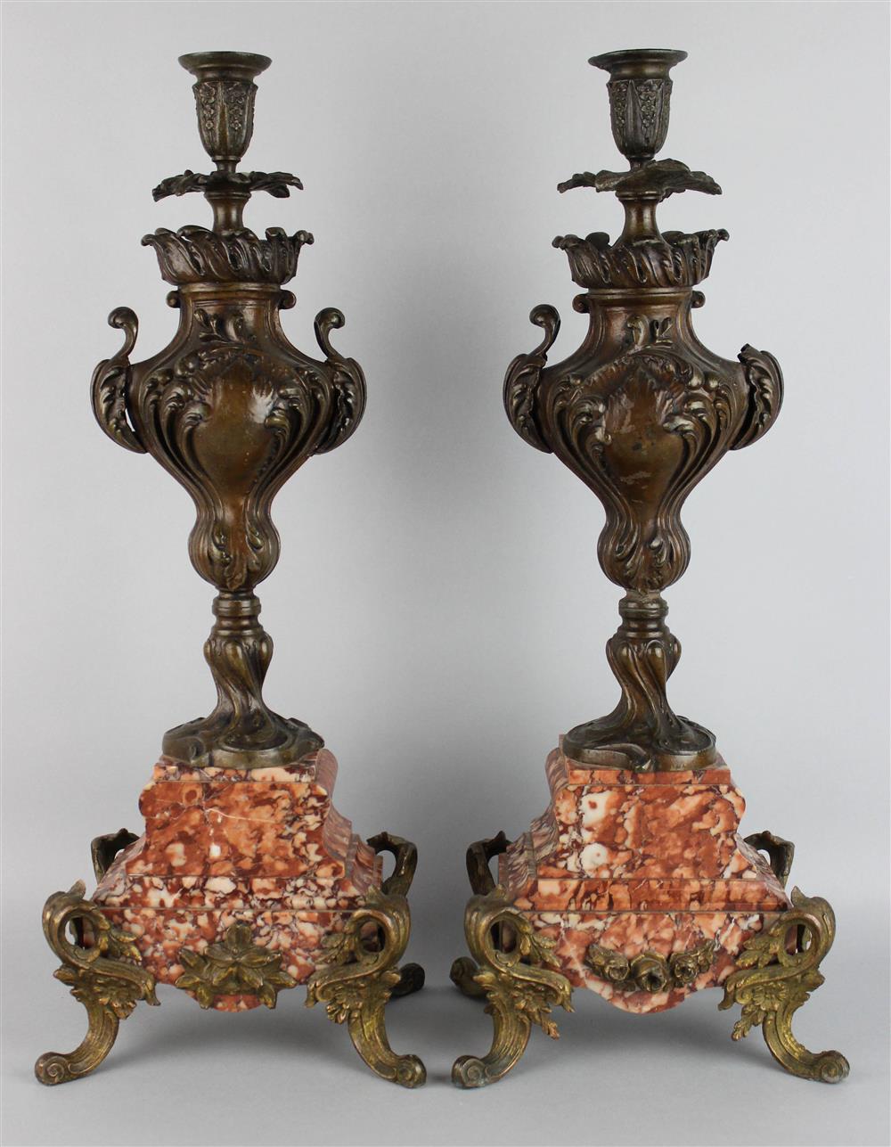 Appraisal: PAIR OF LOUIS XV STYLE PATINATED METAL AND MARBLE CANDLESTICKS