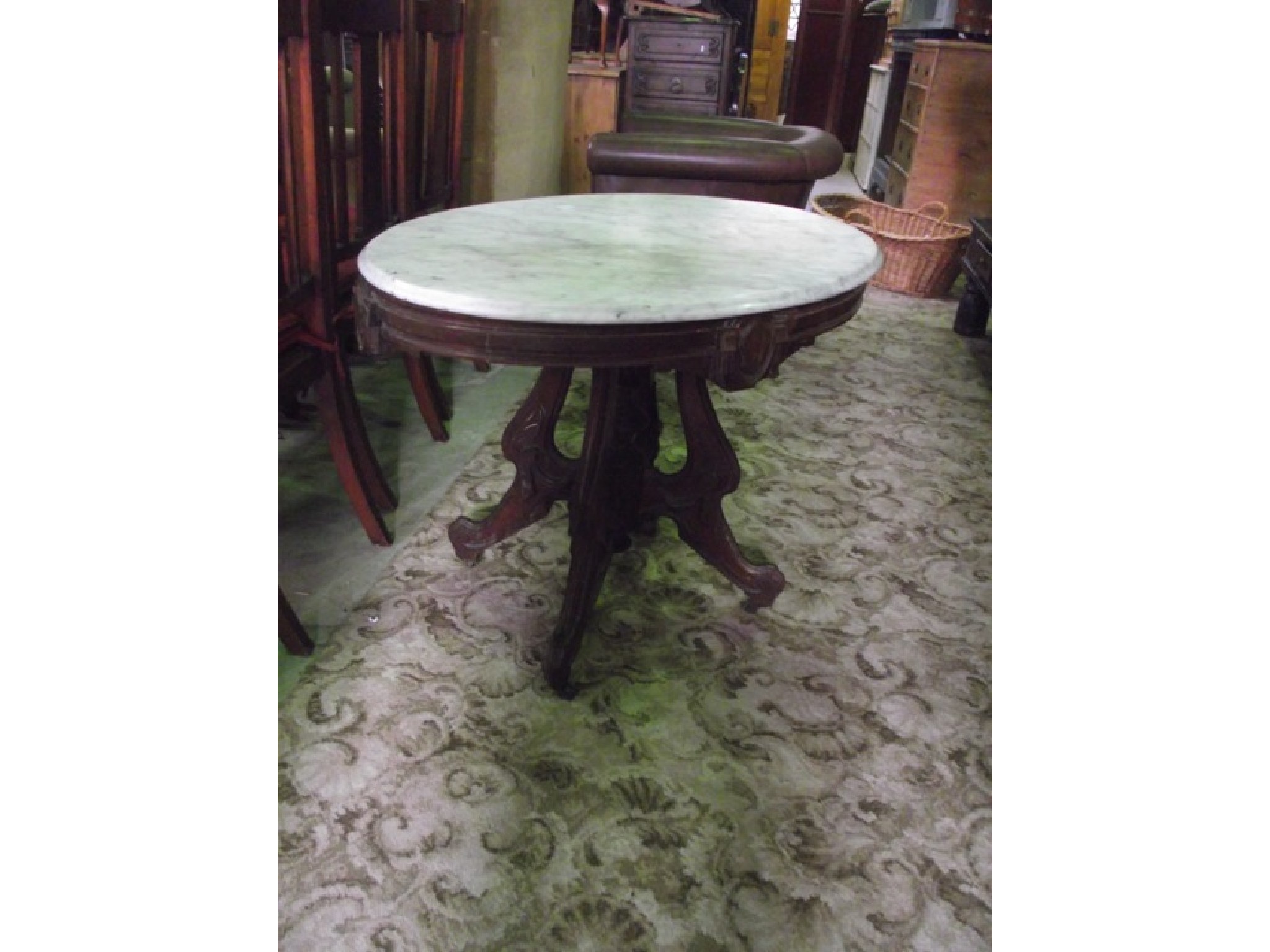 Appraisal: A th century Continental occasional table on a quadruped base