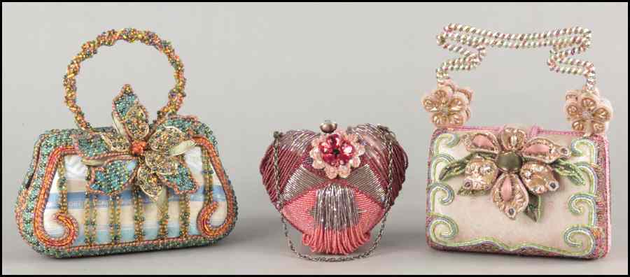 Appraisal: THREE MARY FRANCES BEADED HANDBAGS Comprised of one heart form