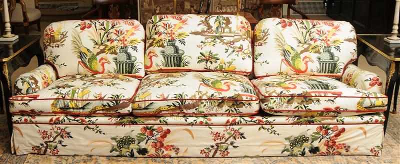 Appraisal: COTTON UPHOLSTERED THREE-SEAT SOFA With chinoiserie designs and rope twist