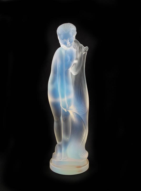 Appraisal: An Etling opalescent glass figure of a woman