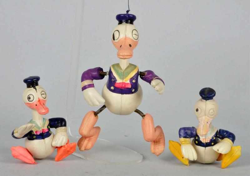 Appraisal: Lot of Celluloid Disney Donald Duck Figures Description Includes one