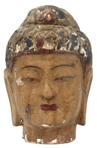 Appraisal: Large carved and painted wood head of the Buddha likely