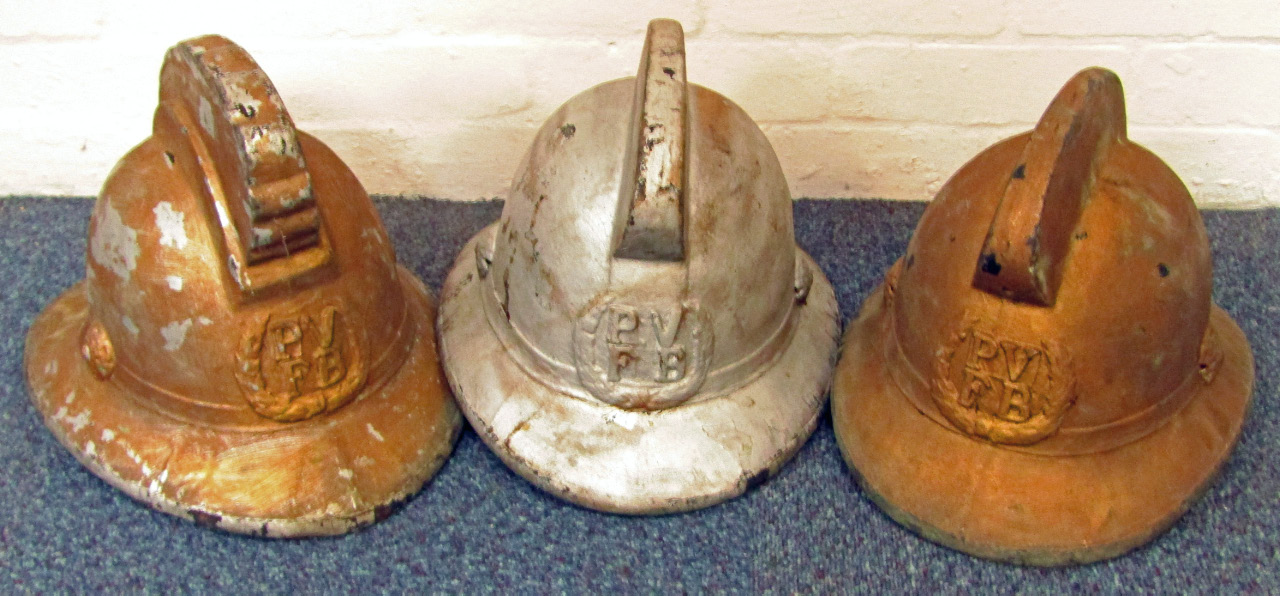 Appraisal: Three Merryweather and Sons fireman's helmets embossed to the front