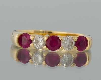 Appraisal: A Ladies' Ruby and Diamond Band k yellow gold ring