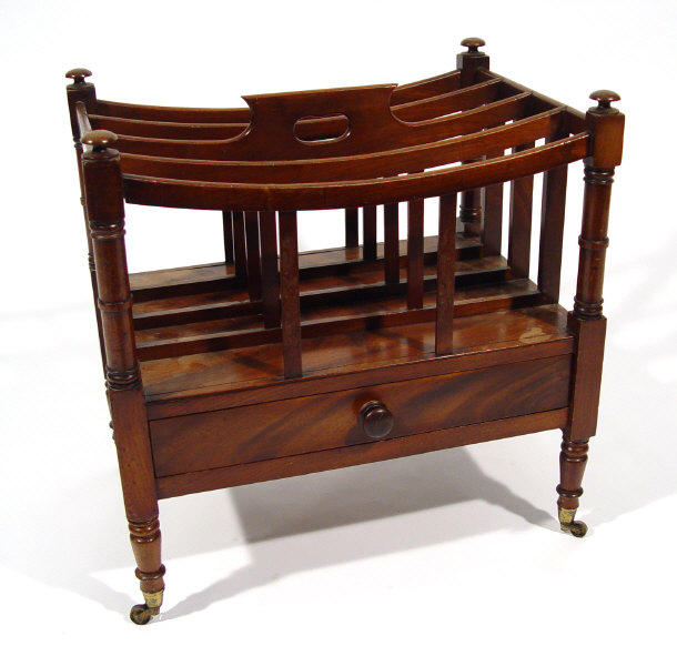 Appraisal: Georgian mahogany canterbury with four divisions above a frieze drawer