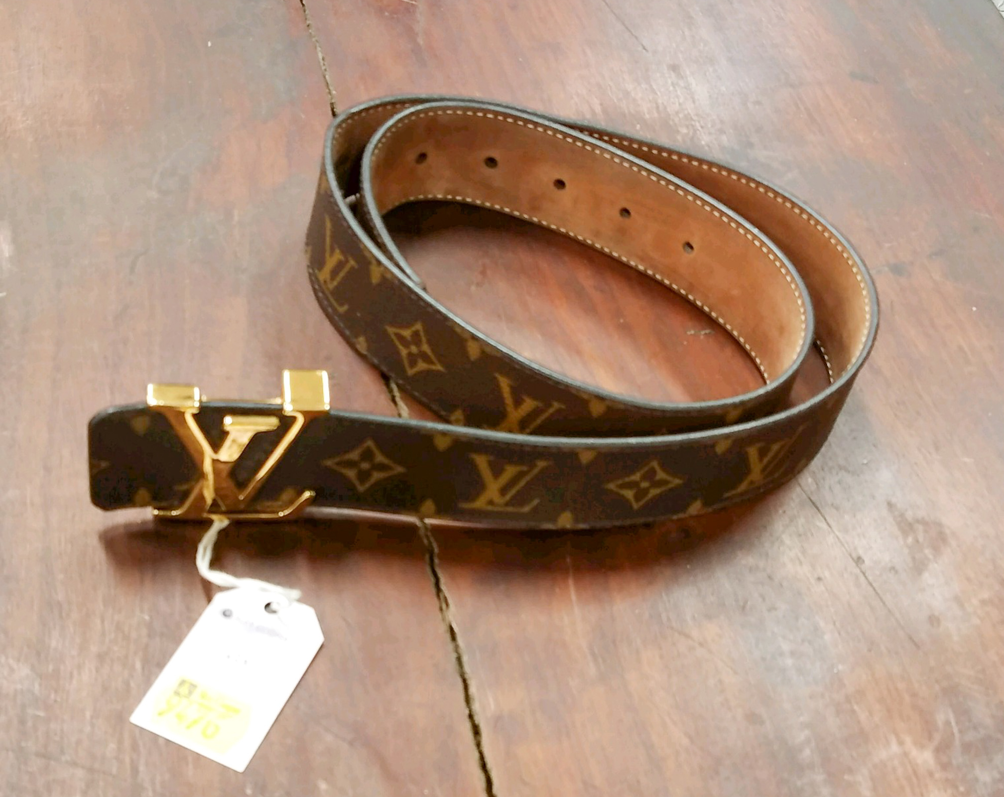 Appraisal: A LOUIS VUITTON INSPIRED BELT Brown and tan monogram Louis