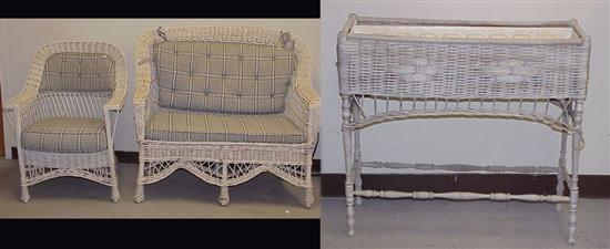 Appraisal: White wicker matching loveseat and chair with cushions along with