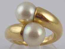 Appraisal: A French hallmarked carat gold Cartier cultured pearl cross over