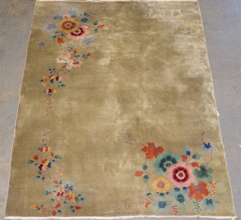 Appraisal: x Nichols Chinese rug pale green with floral sprays in