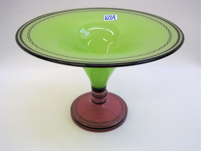 Appraisal: CZECH GLASS COMPOTE having a green bowl raised on pink