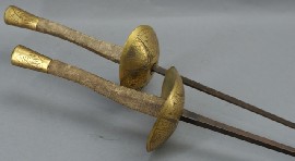 Appraisal: A pair of fencing foils inch blades with metal guards