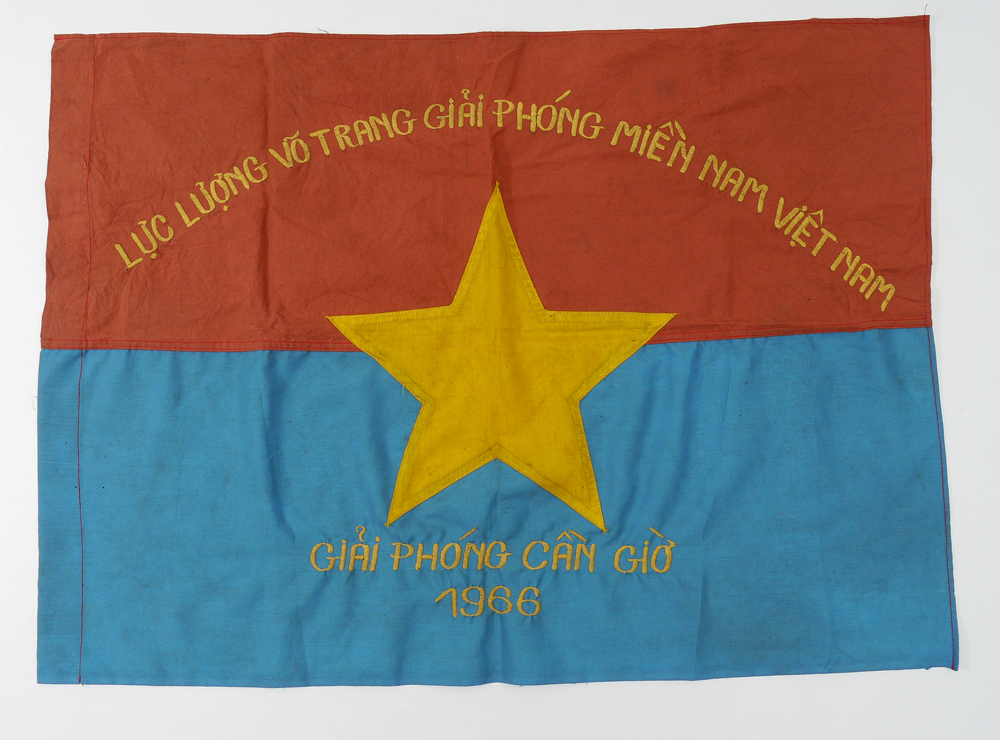 Appraisal: CAPTURED VIETNAM FLAG Faded red over blue with yellow star