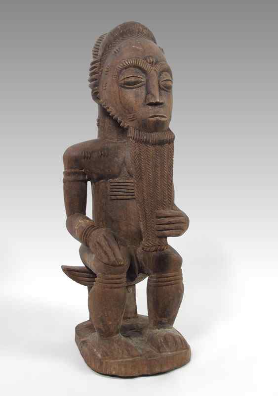 Appraisal: CARVED AFRICAN ASIE USA FIGURE - IVORY COAST LBS ''