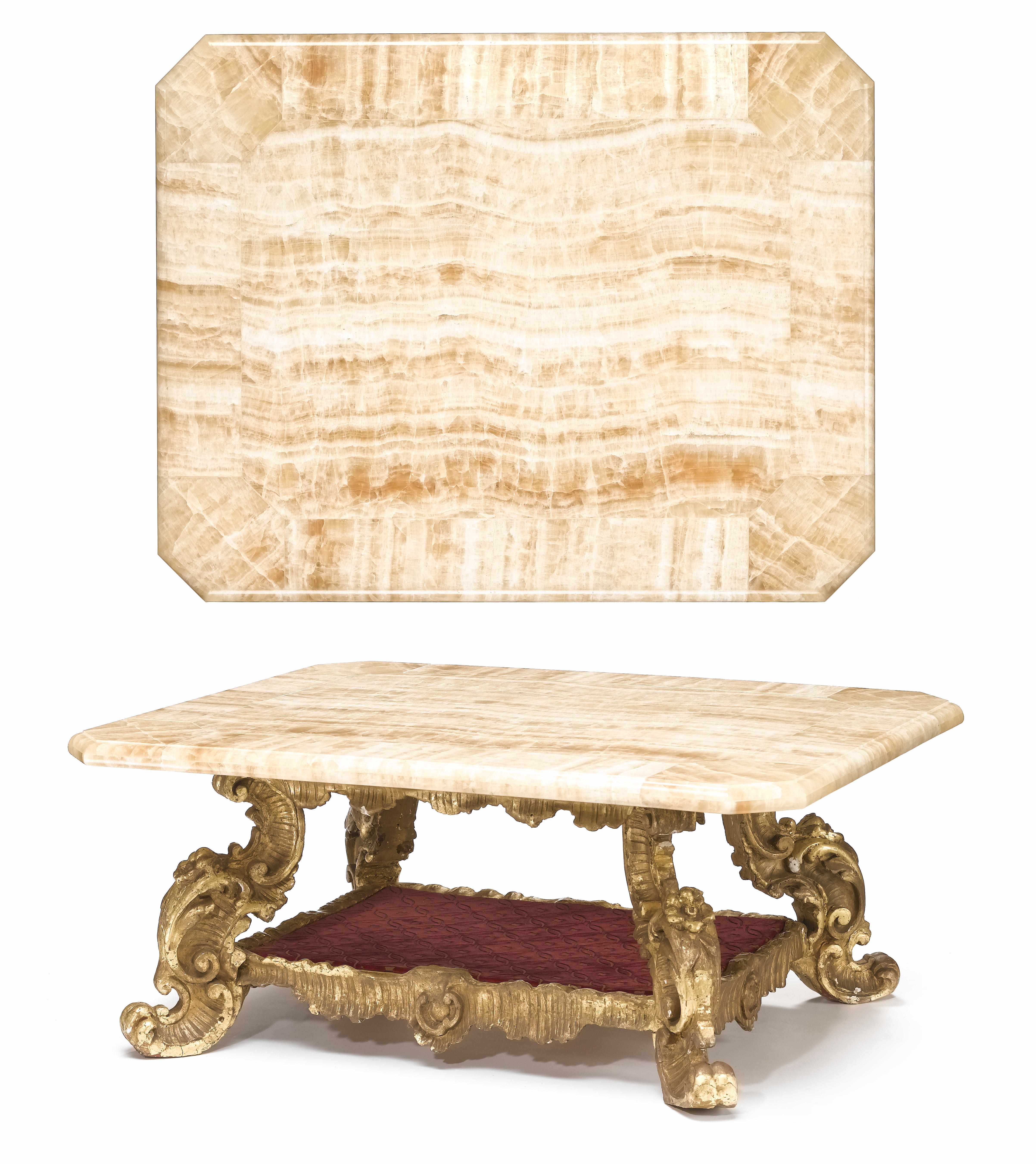 Appraisal: An Italian Baroque carved giltwood low center table incorporating antique