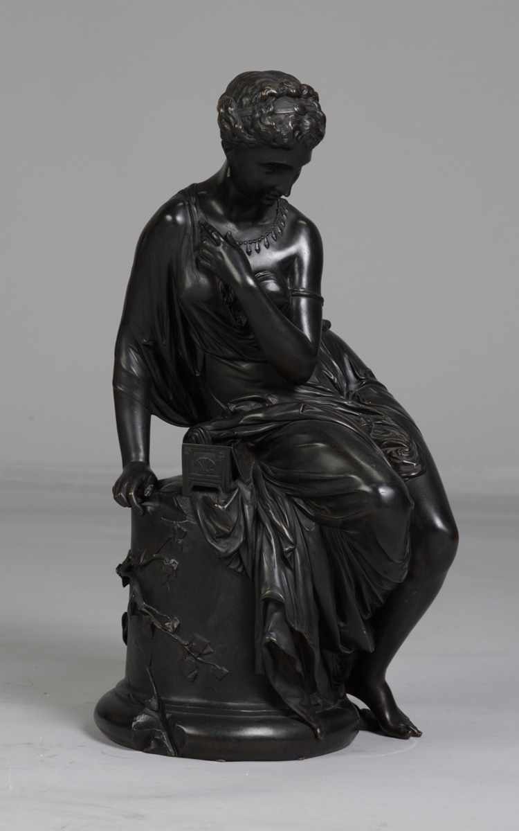 Appraisal: Victorian Bronze Sculpture of a Seated Robed Lady On plinth