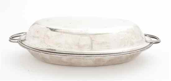 Appraisal: A George III Silver Entree Dish Henry Greenaway London of