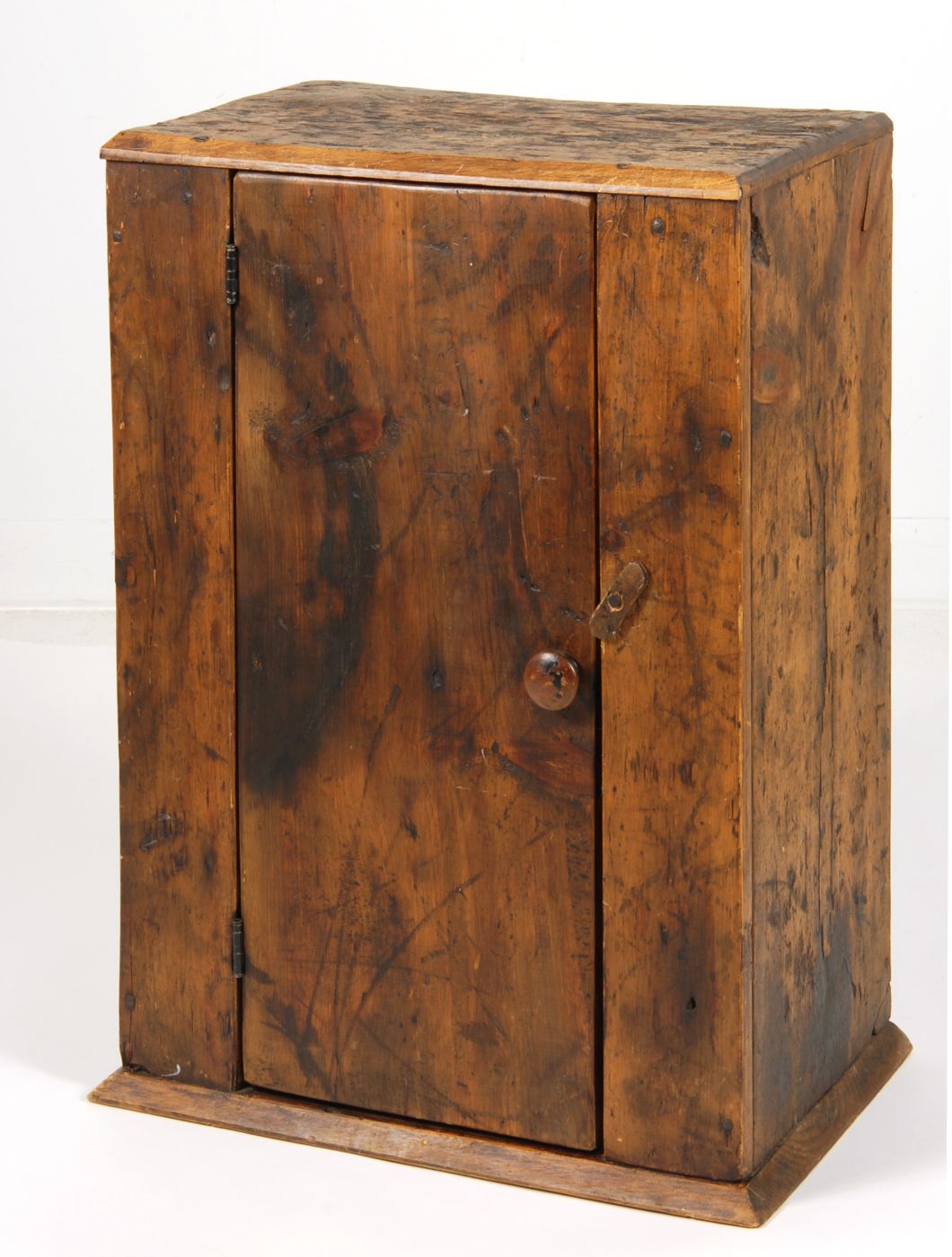 Appraisal: HANGING WALL CABINET th CenturyIn pine with old brown finish