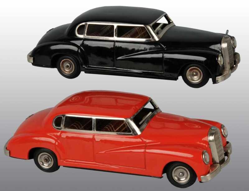 Appraisal: Lot of Tin Mercedes Automobile Wind-Up Toys Description German Working