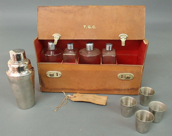 Appraisal: Leather cased bar set with decanter bottles shaker and four