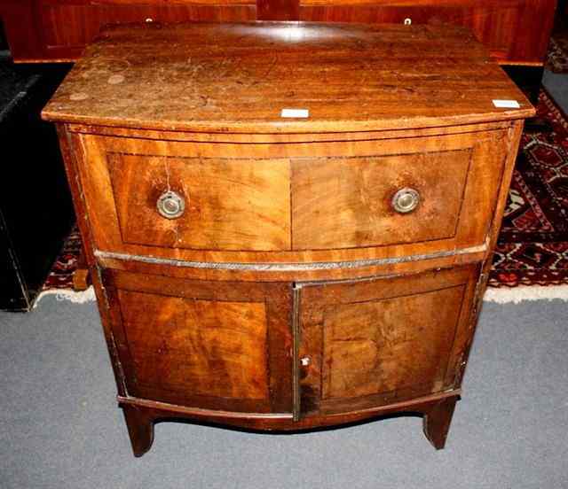 Appraisal: A TH CENTURY BOW FRONTED MAHOGANY COMMODE with one long