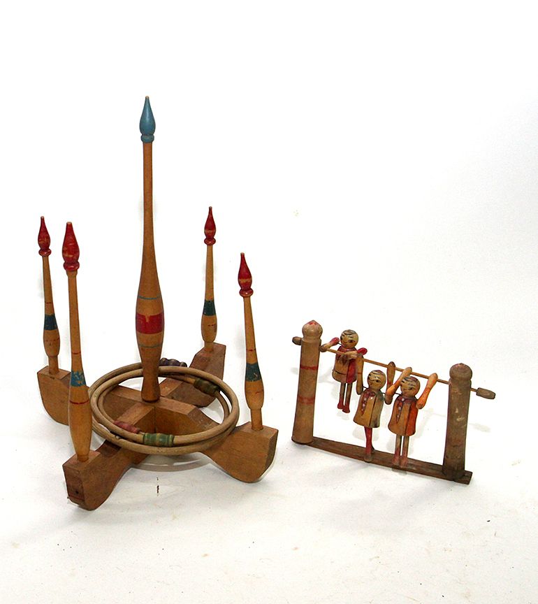 Appraisal: Early Wood Toys Late th century ring-toss game which is