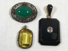 Appraisal: An oval silver mounted chrysoprase together with a silver mounted