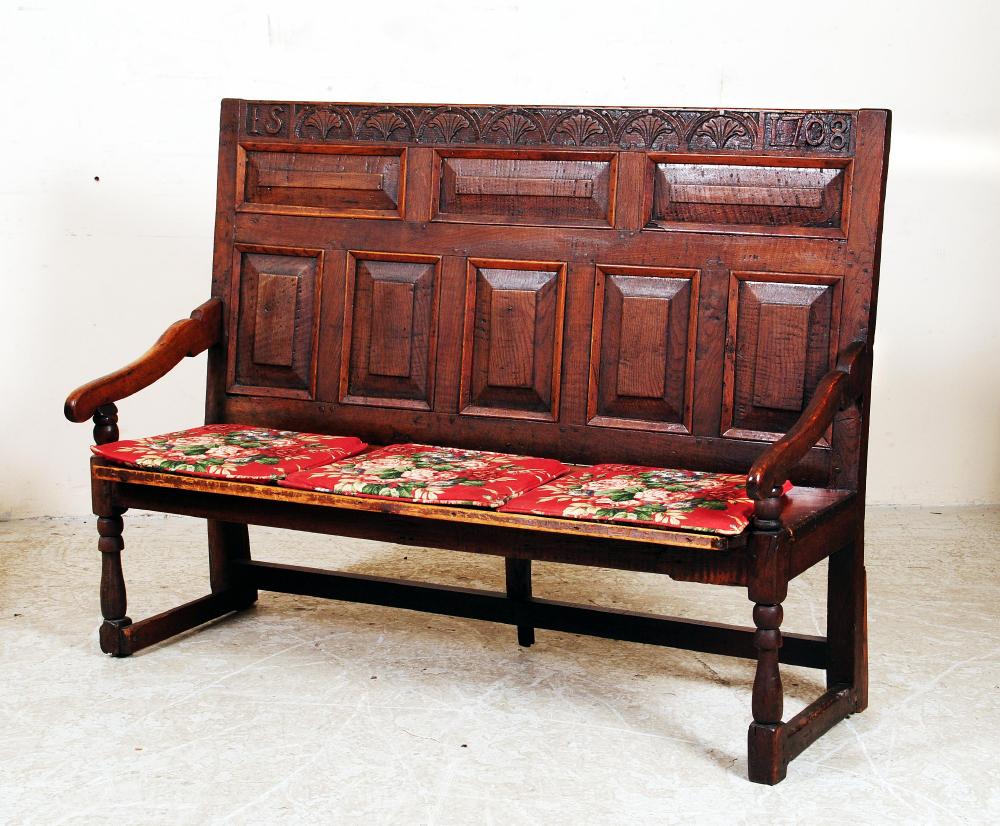 Appraisal: A SMALL OAK SETTLE th century the back with eight