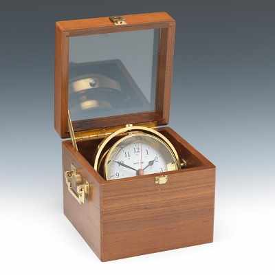 Appraisal: Quartz Ships Clock A walnut boxed Quartz ships clock has