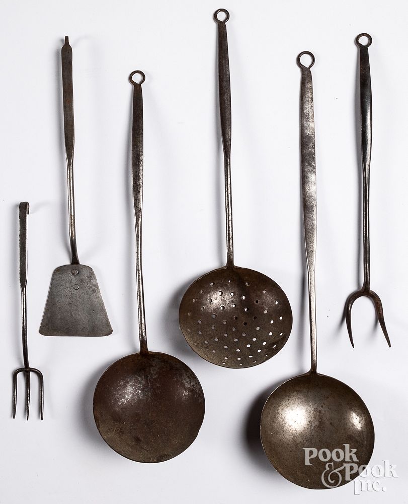 Appraisal: Six wrought iron long handled utensils th c Six wrought