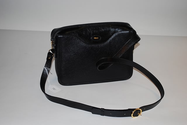 Appraisal: Bally black leather shoulder bag with compartments and zipper zipper