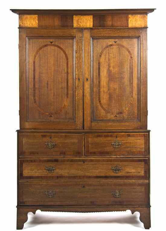 Appraisal: A Georgian Style Oak Linen Press in two parts the