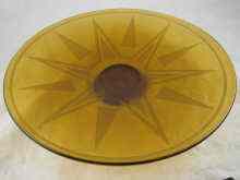 Appraisal: An amber glass dish with etched or sandblasted Art Deco