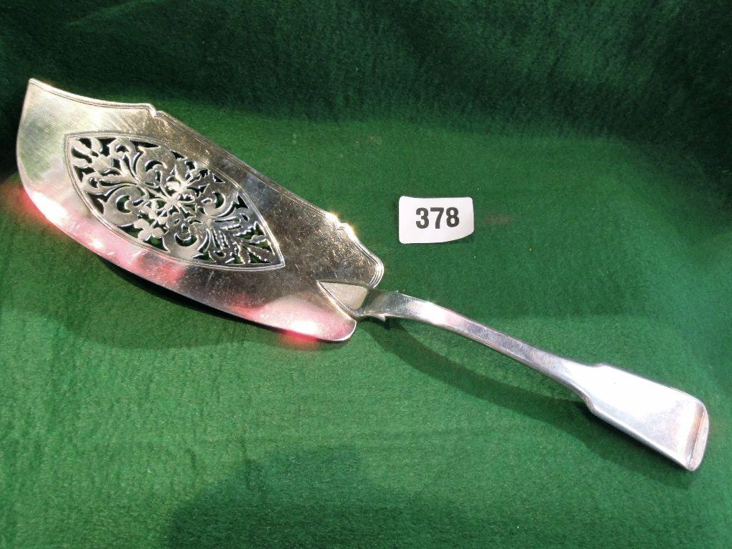 Appraisal: A George III silver fish slice with open filigree scrolled