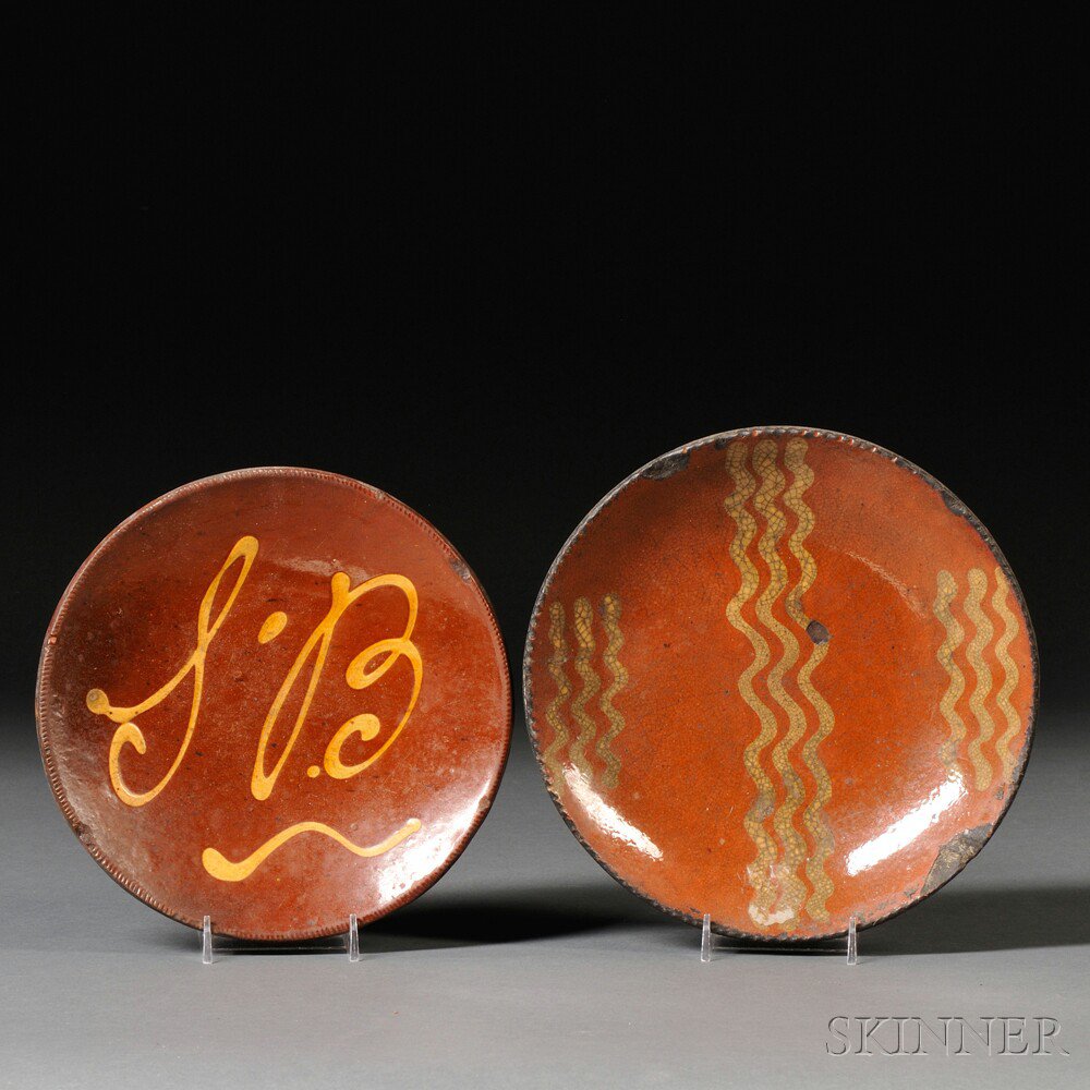 Appraisal: Two Slip-decorated Redware Plates America early th century round plates