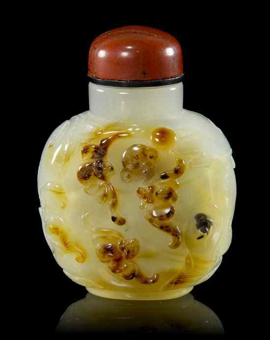 Appraisal: An Agate Snuff Bottle the banded stone having naturalistic style