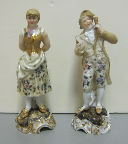 Appraisal: TWO FRENCH PORCELAIN FIGURINES Young man and maiden in matching